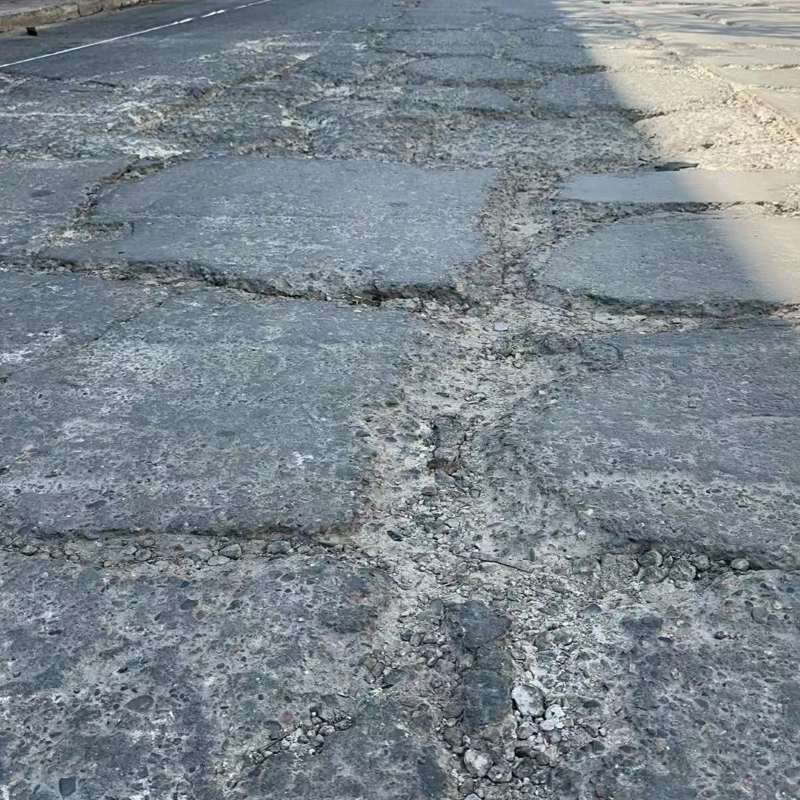 鹤城路面起砂露石子修补料